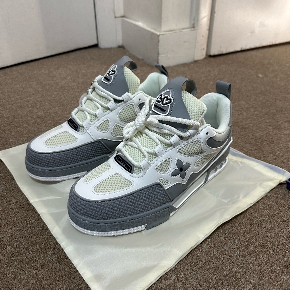 LV skates gray and white
